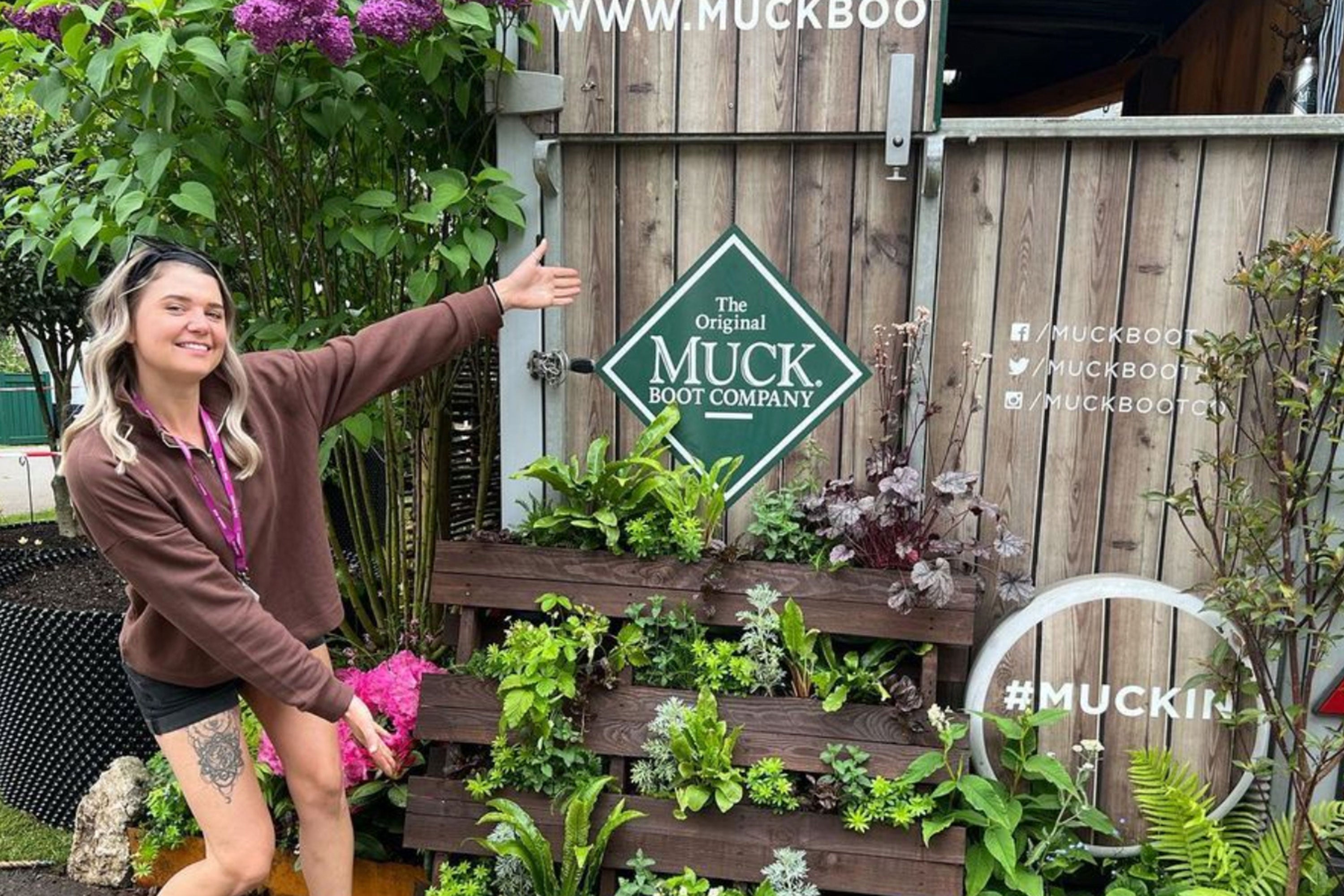 Gemma Pole showing off the Muck Boots stand at the Chelsea Flower Show