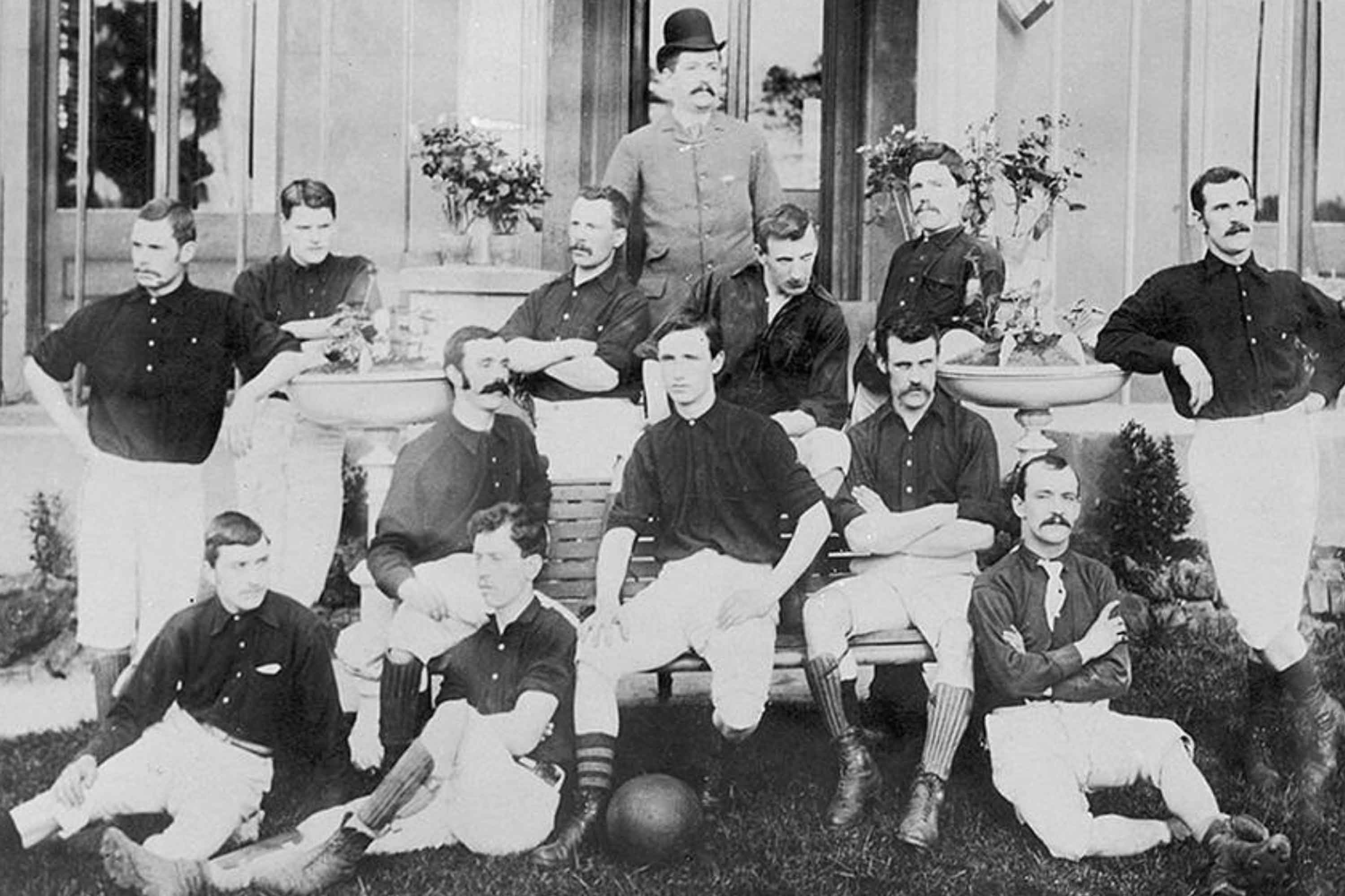 A black and white photo of the Arsenal Football Club taken in the late 19th Century