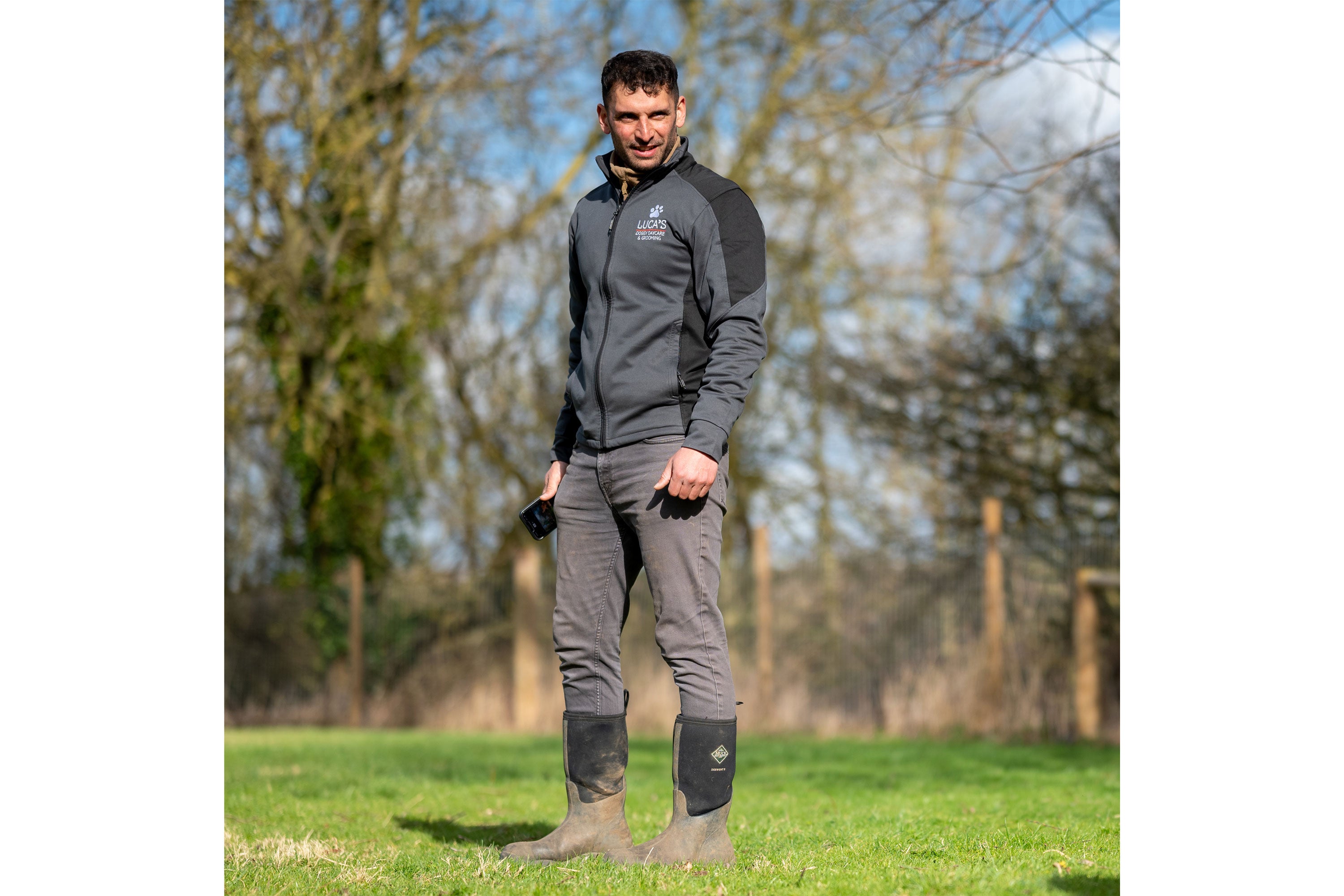 Luca's Doggy Daycare & Grooming founder, Philip Wood wearing a pair of Muck Boots