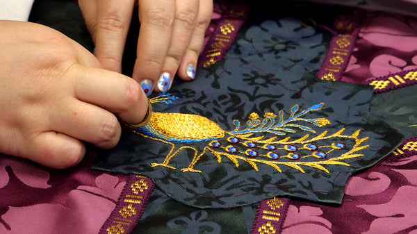 Hand-sewing a chasuble embroidery