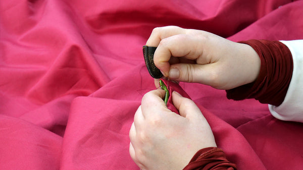 Hand-sewing magenta lining