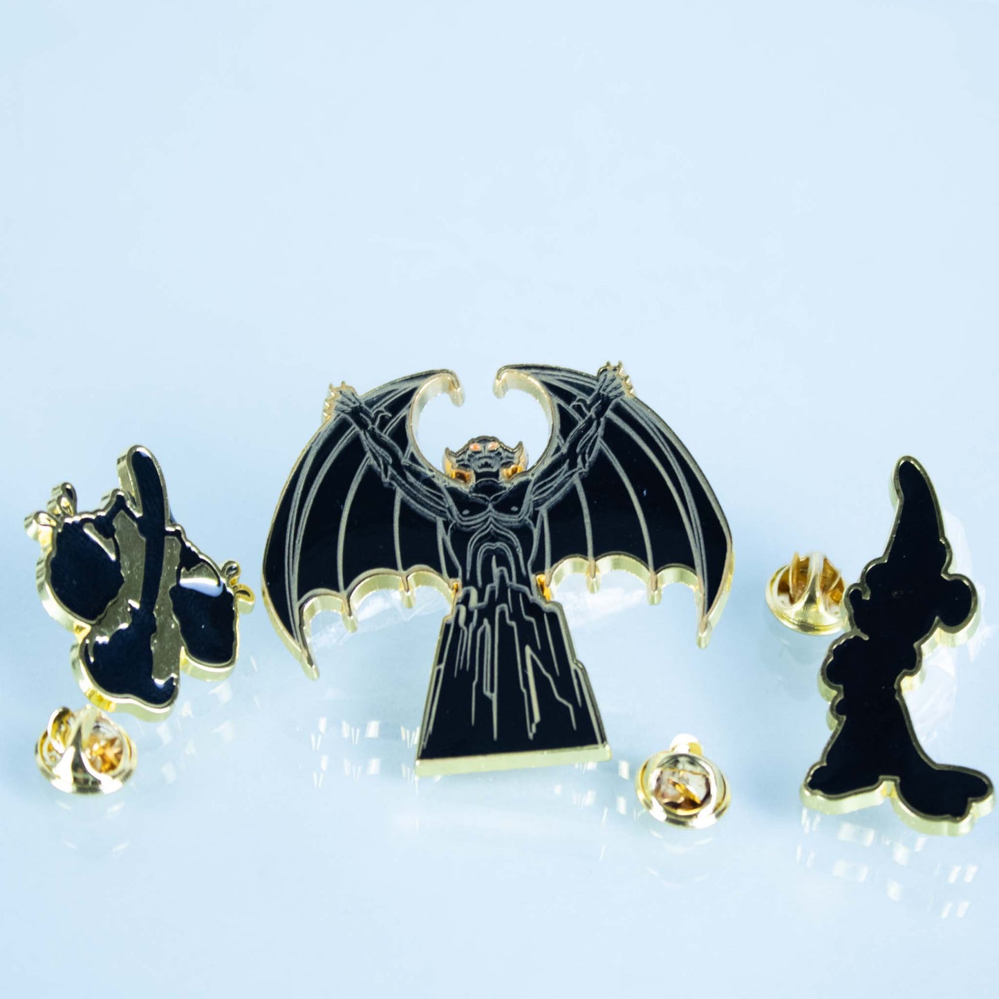 https://cdn.shopify.com/s/files/1/0409/4971/1001/products/Fantasia-_Disney_-Enamel-3-Pin-Set-2_1445x.jpg?v=1647634205