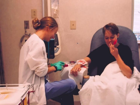 Heidi and a nurse during a treatment
