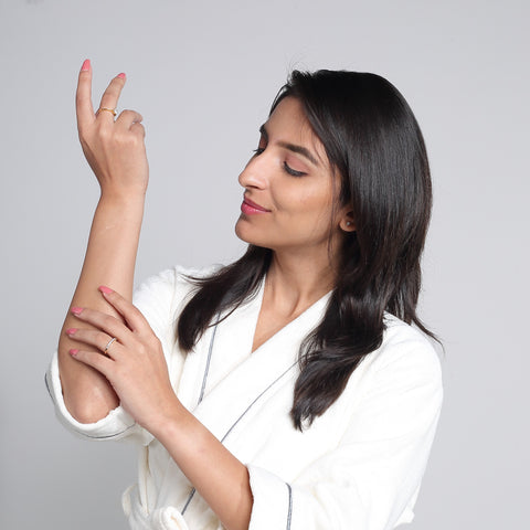 girl looking at her hand