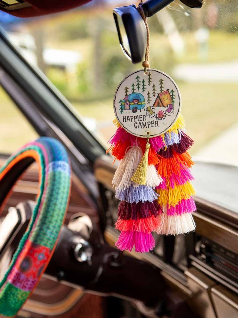 Air freshener hanging from mirror