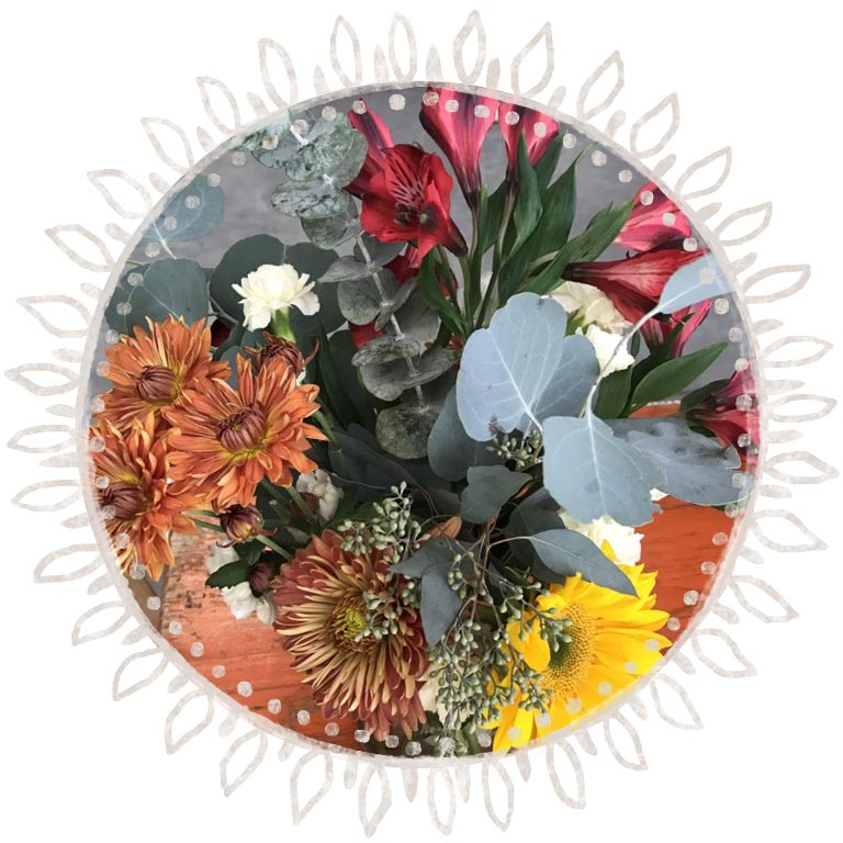 photo of a fall themed flower arrangement