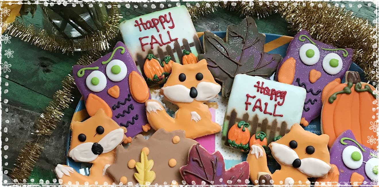photo of owl and fox shaped cookies in a fall colored theme