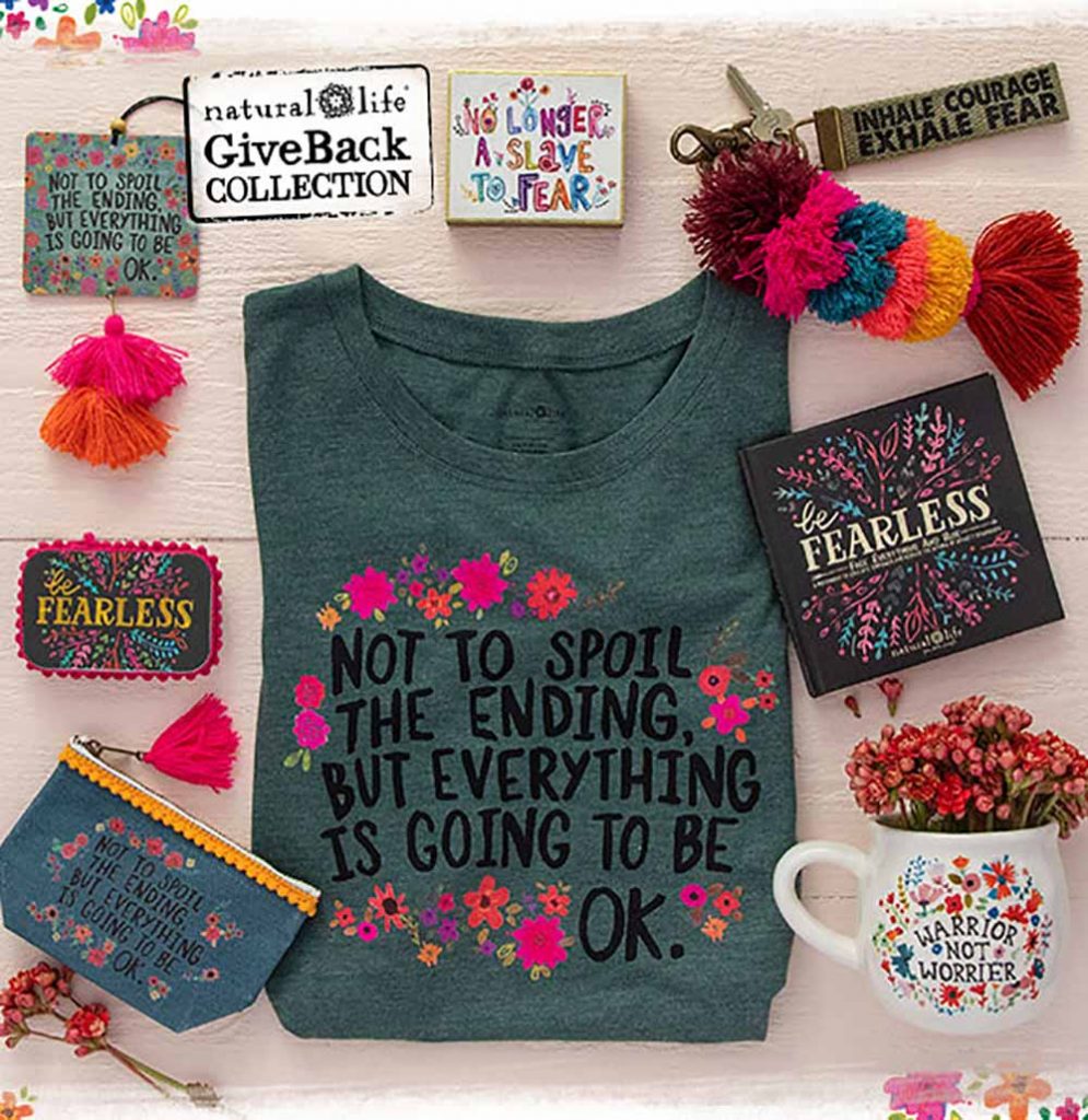 Inspirational Giveback Collection, FEARLESS, featuring flatlay with a tee, mug, book, prayer box and more.