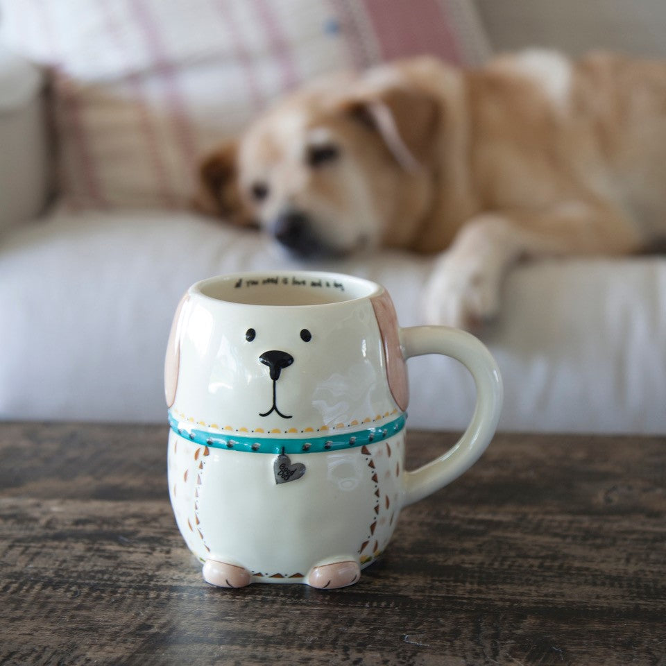 Dog behind mug shaped like him