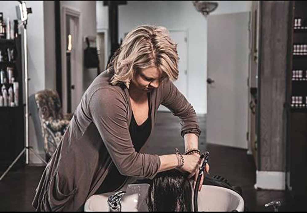 Brittany giving back by providing free hairstyling to women in rehab
