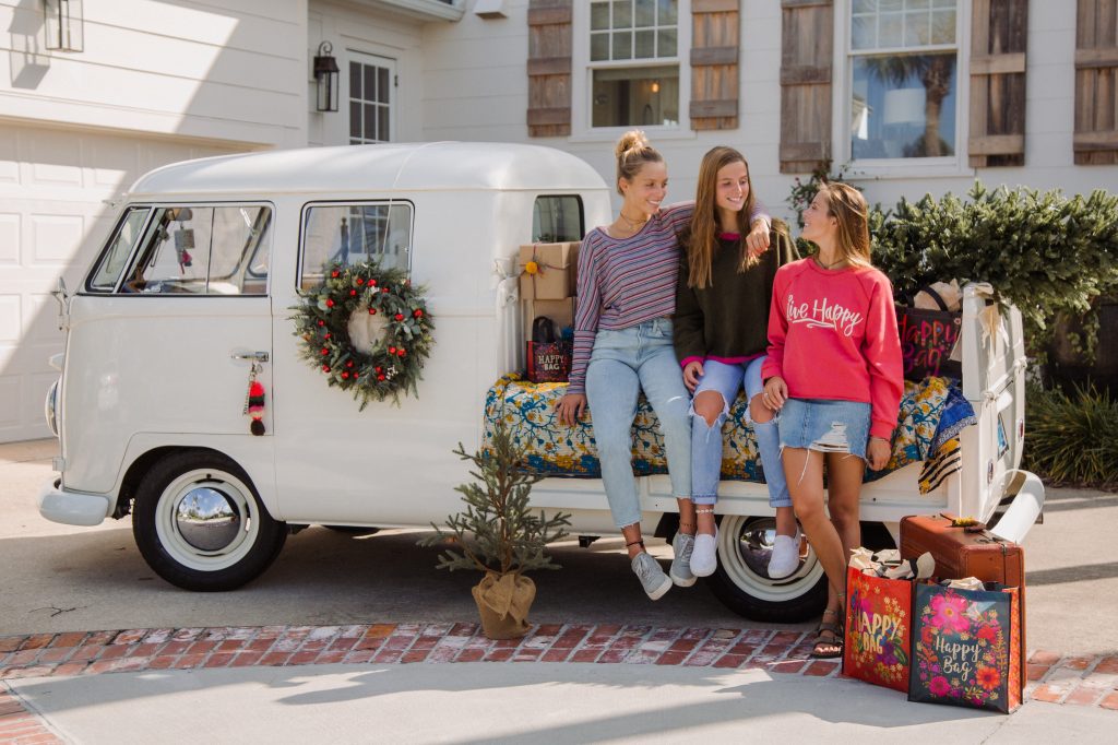 Girls hanging out outside of holiday party