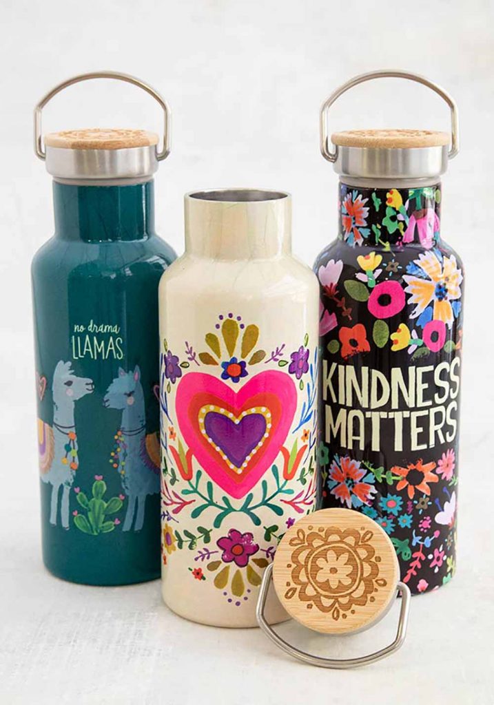 Traveler bottles with colorful sentiments to pack with your picnic blanket!