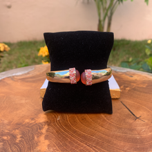 Load image into Gallery viewer, Gold Tone Clamp Bracelet with Pink Stones
