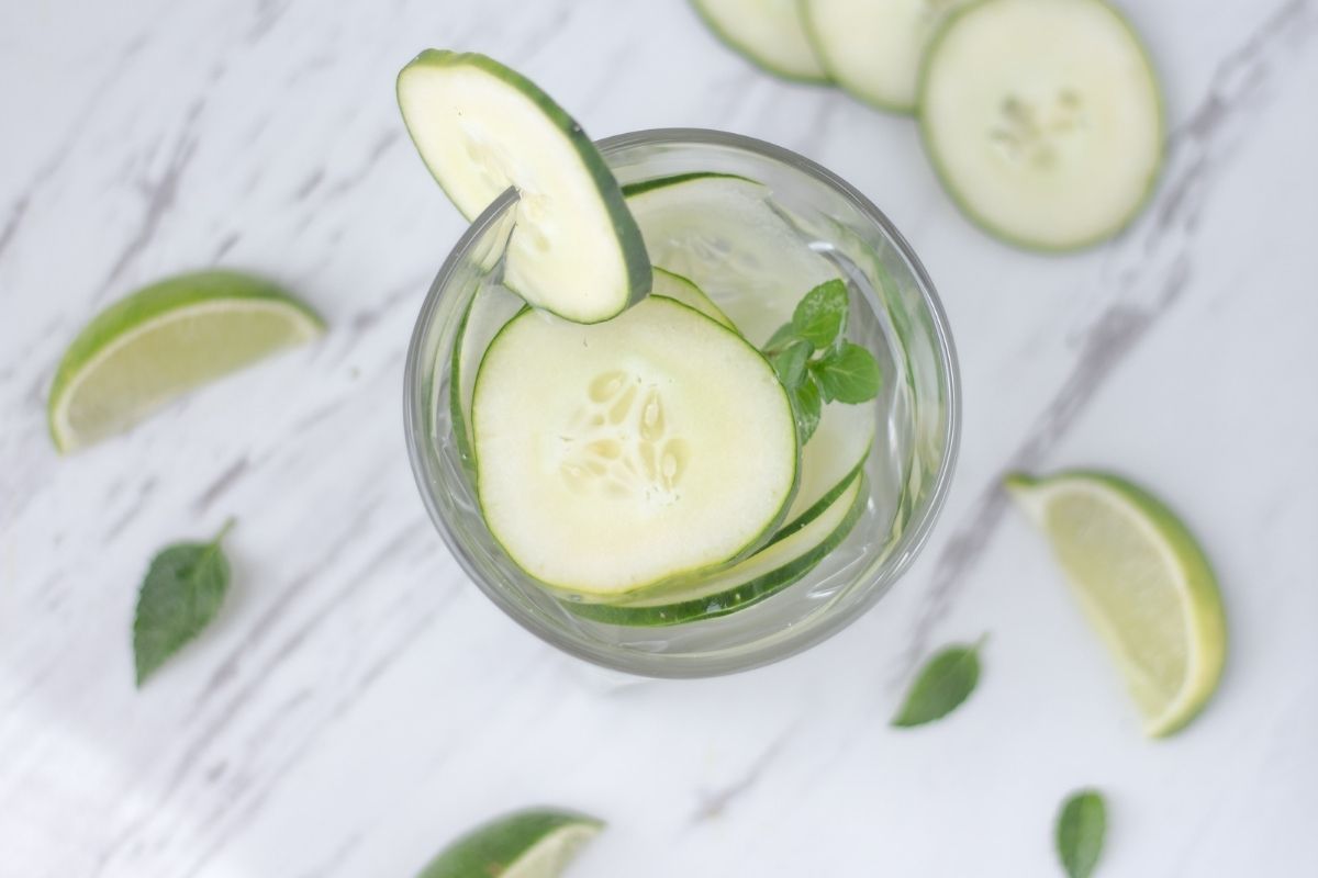 cucumber water on white wood