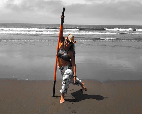 Stick Mobility Coach Deb training on beach