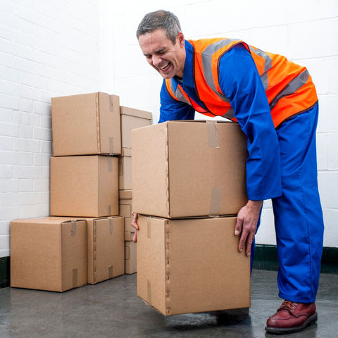 man lifting heavy boxes