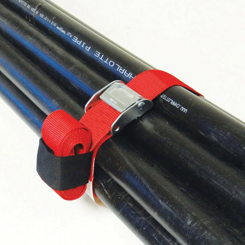 Cargo strap holding together plastic piping