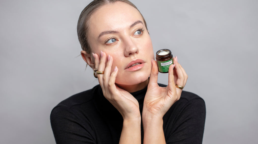 Antipodes skincare model with Kiwi Seed Oil Eye Cream