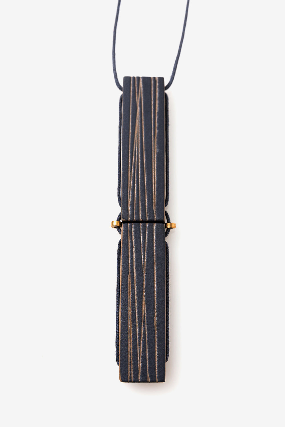 Alabama Chanin Vertical Bar Necklace by Heath Ceramics. Handmade Clay Necklace with Striped Pattern in Indigo Color.