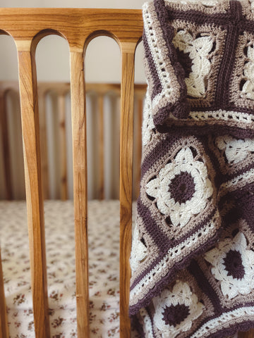timber cot, knit baby blanket, crochet