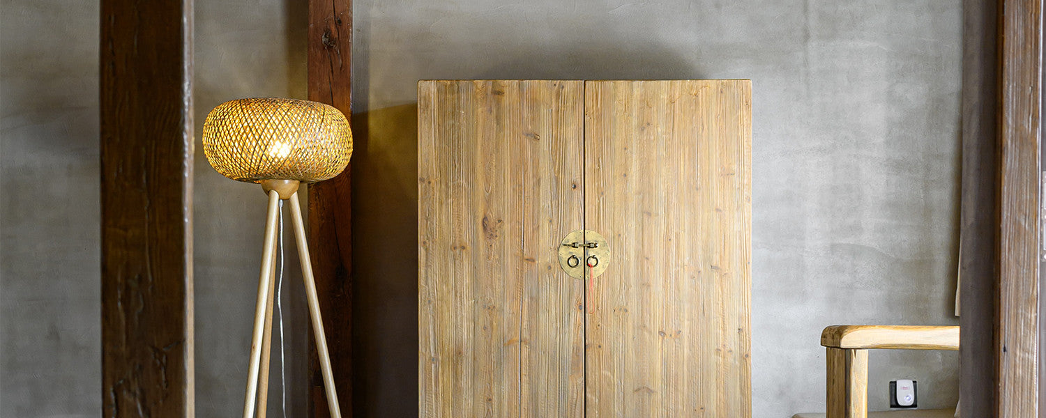 Wooden wardrobe by the cement wall