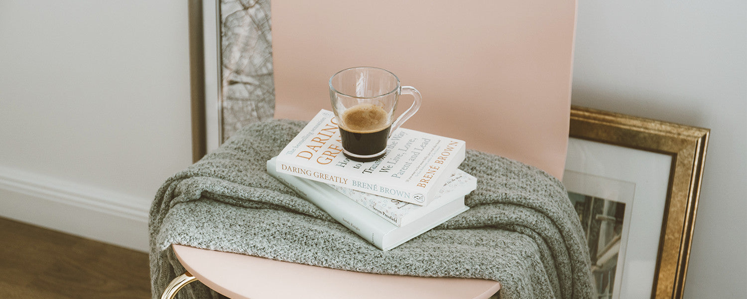 Blanket, books on the chair