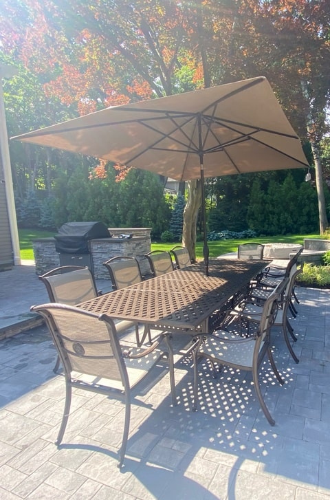 Glen Lake Home and Patio Baymont Sling Dining with Aluminum Weave Extension Table 11 piece Dining Long Island Patio Furniture