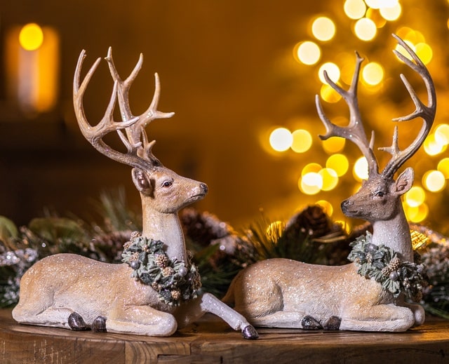 Melrose Sitting Reindeer with Wreath Necklace for Tabletop Christmas Decor