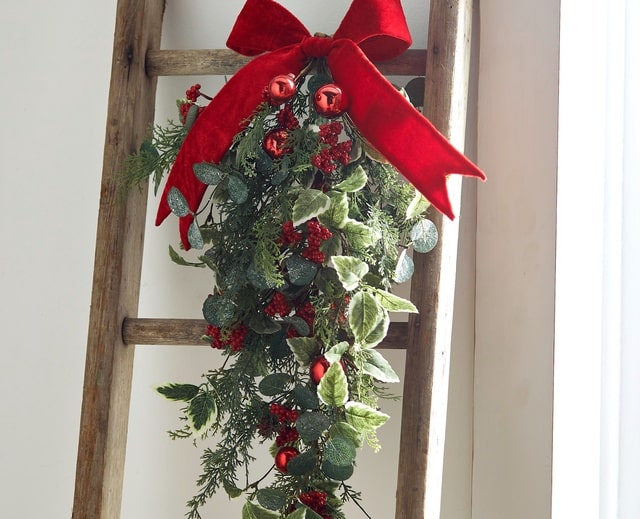Raz Imports Decorative Blanket Ladder With Holiday Spray of Holly Frosted Eucalyptus and Red Berries with Red Velvet Bow