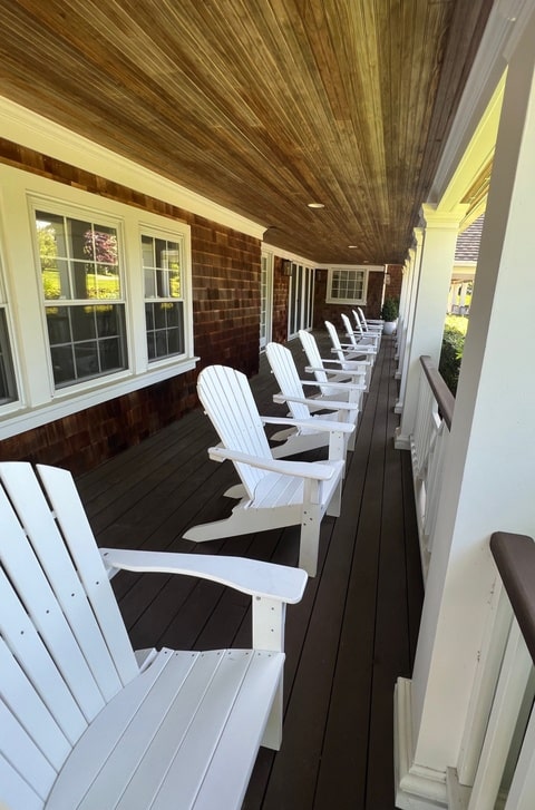 Seaside Casual White Polymer Adirondack Chairs Long Island Porch View