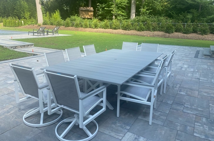 Windward 11 Piece Outdoor Dining 60x110 Tahoe Dining Table Juno Dining Chairs Long Island Furniture Delivery