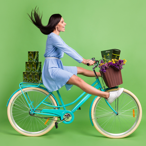 Girl on bike with RECOVERYbits chlorella 