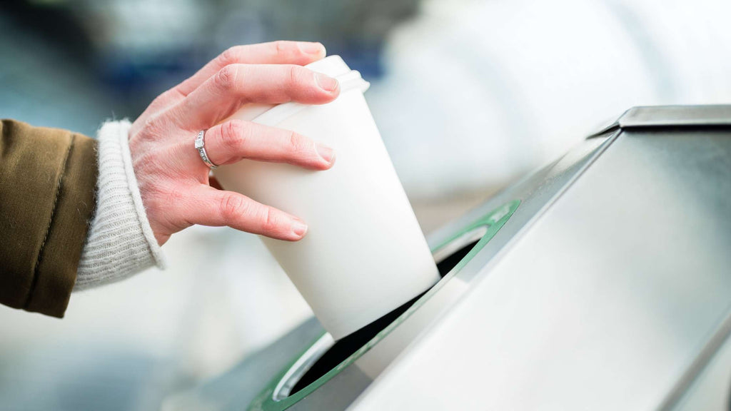 Coffee shop waste - throwing away disposable cups