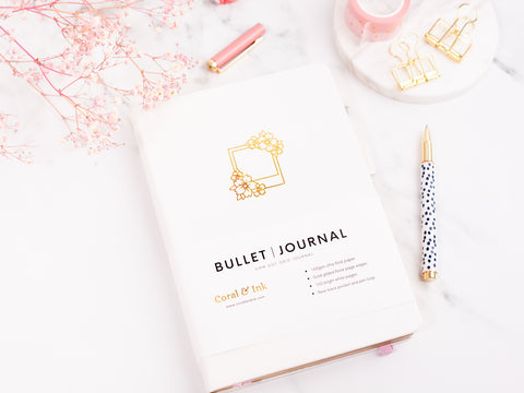 Coral and Ink's white polaroid bullet journal