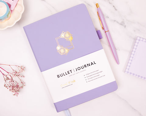 Coral and Ink's purple sunflower bullet journal