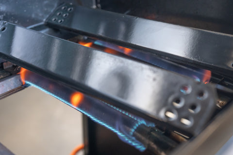 what causes yellow flames on a gas grill?