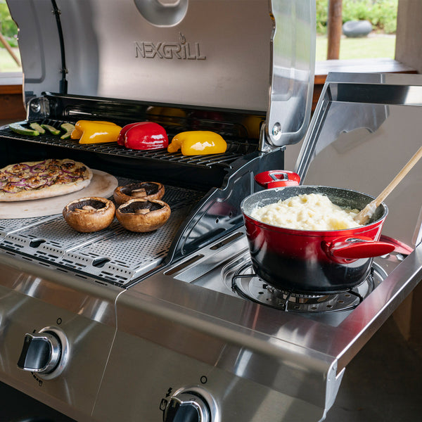 potatoes cooking on grill side burner