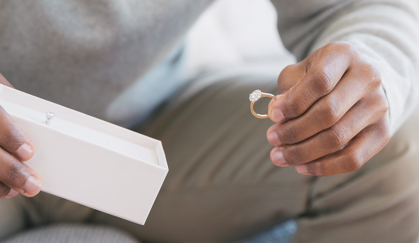 man holding ring