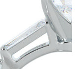 open metal bars hold the diamond similar to channel or tension setting 