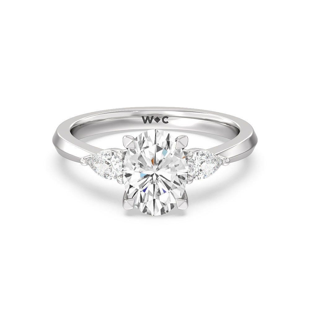 Elegant Three Stone Knife Edge Engagement Ring