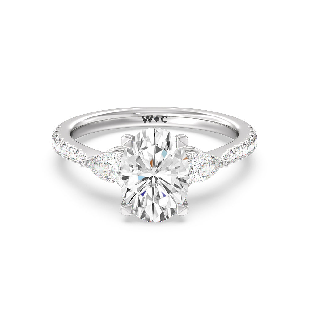 pear three stone pave diamond engagement ring