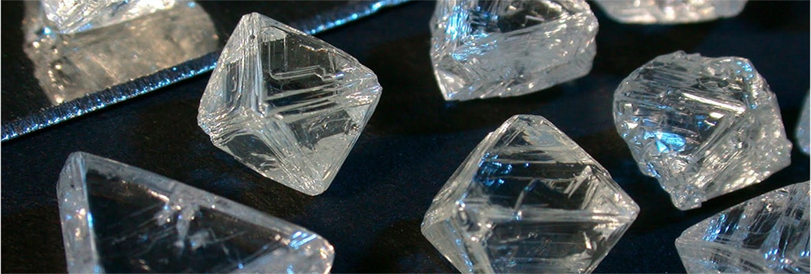 assortment of conflict-free mined rough diamonds for desktop banner