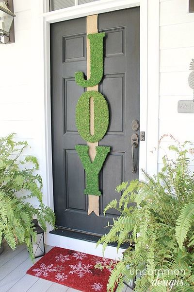 Lettrage sur la porte bonne humeur et joie