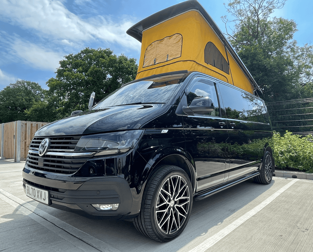 Day Van Conversion Black VW Transporter from Wildworx with yellow pop top roof canvas