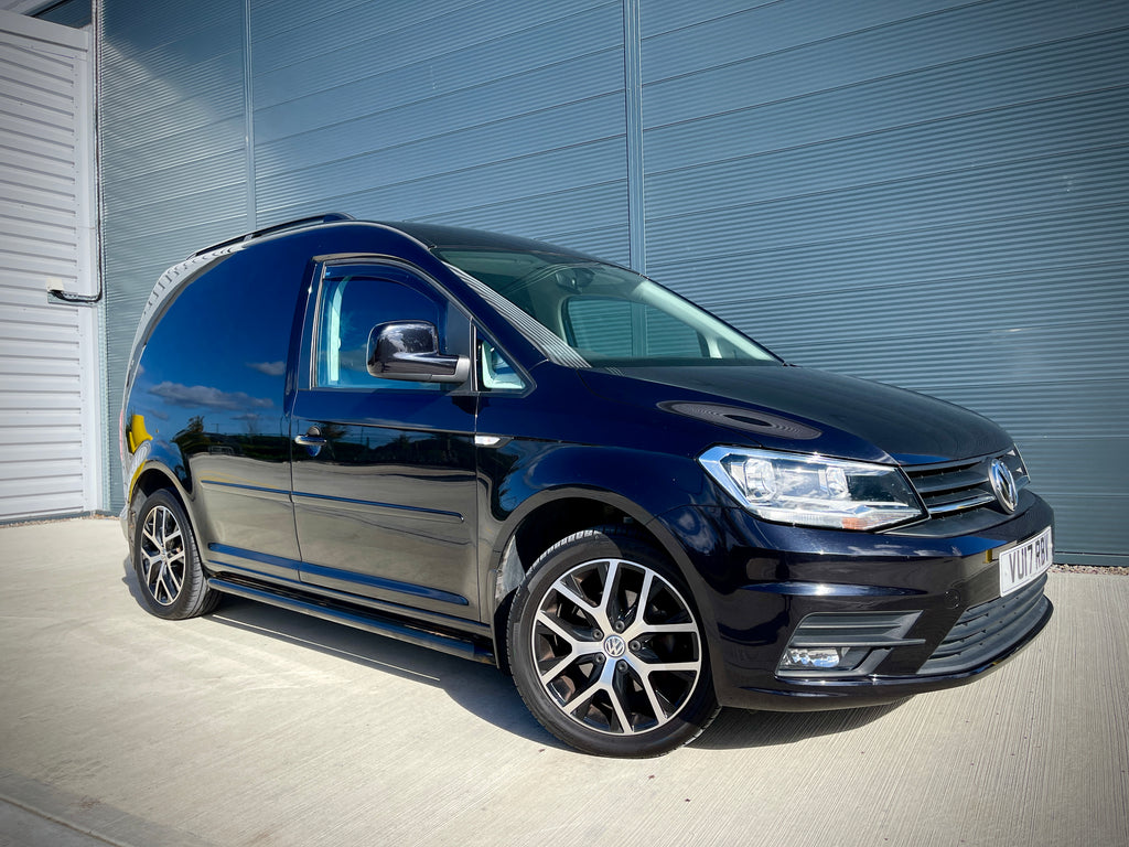 Black VW Caddy as a a Camper from Wildworx