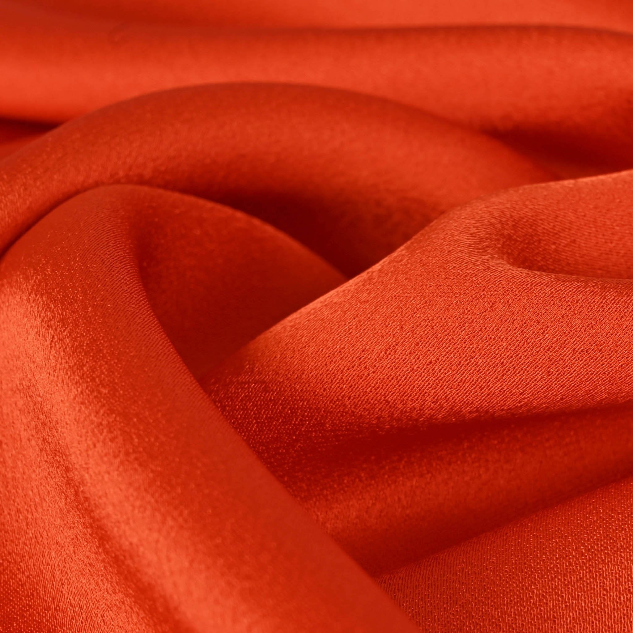 Red satin-backed 100% silk crepe fabric