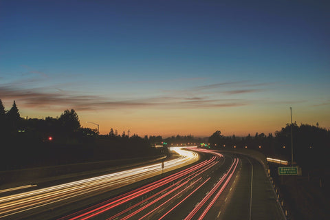 image of a motorway with timelapse vehicles for offset eco friendly delivery