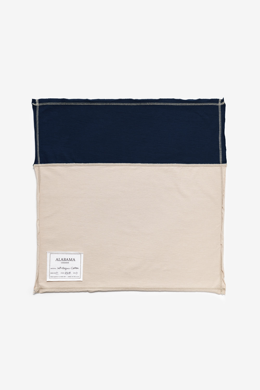 Alabama Chanin Colorblock Dinner Napkins, shown in Navy and Wax colors.