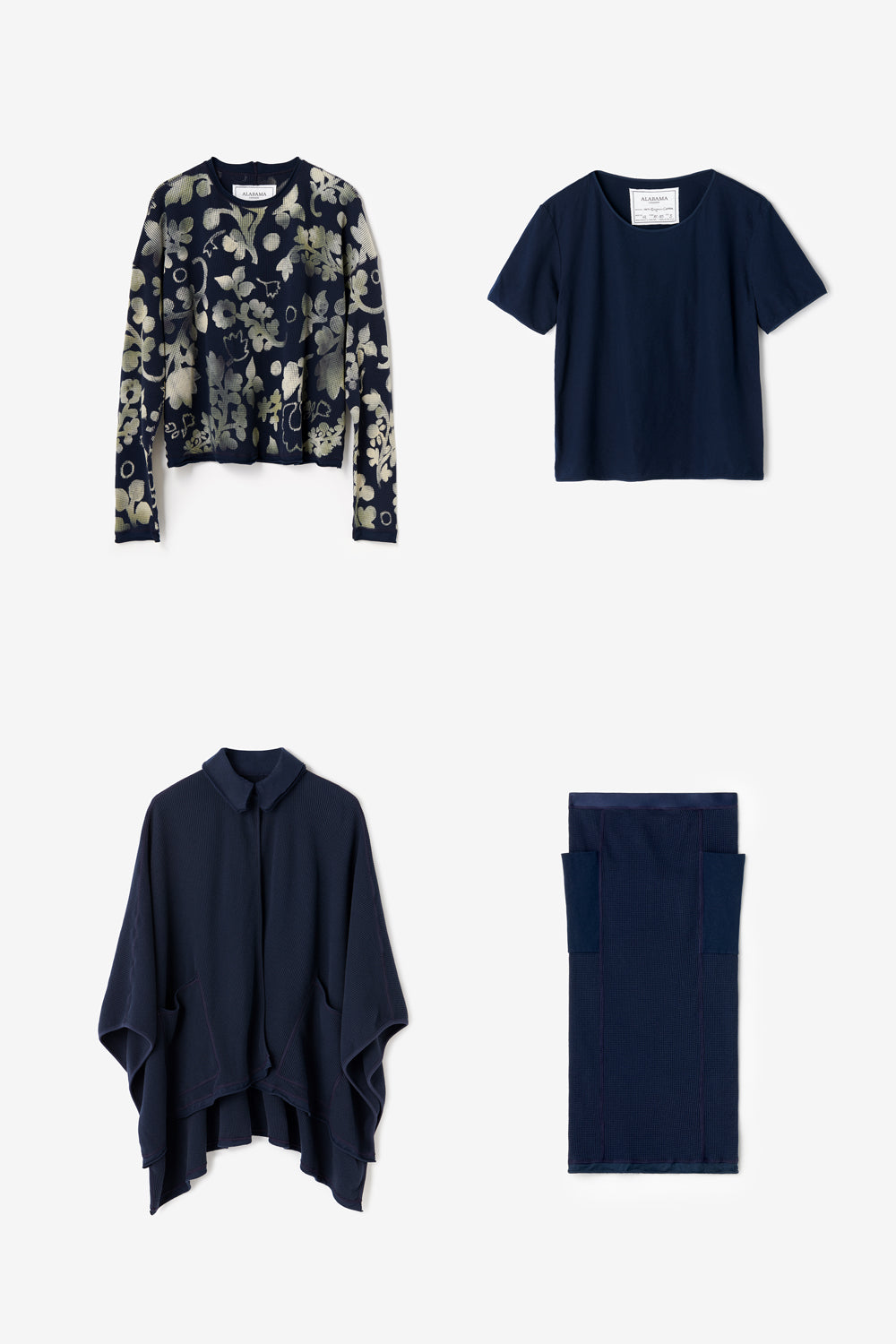 The Viola Tee, Merritt Top, Chelsea Skirt, and Emerson Wrap, all shown in Navy.