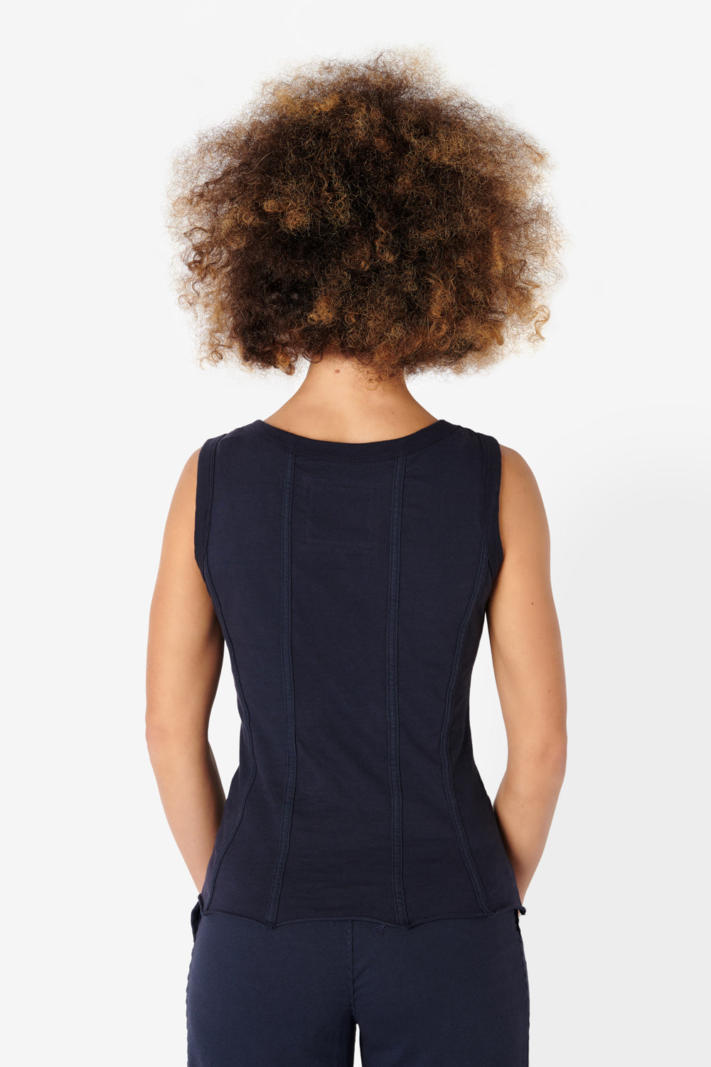 Model wearing The Corset in Navy, shown from the back.